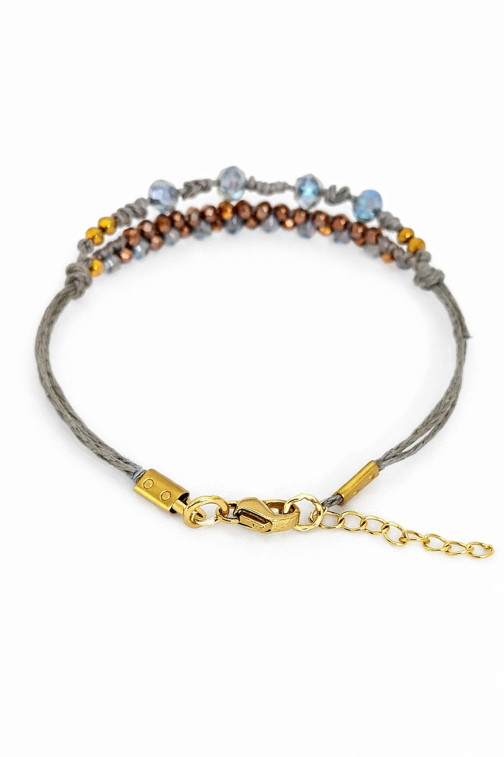 Pulsera azul y bronce.