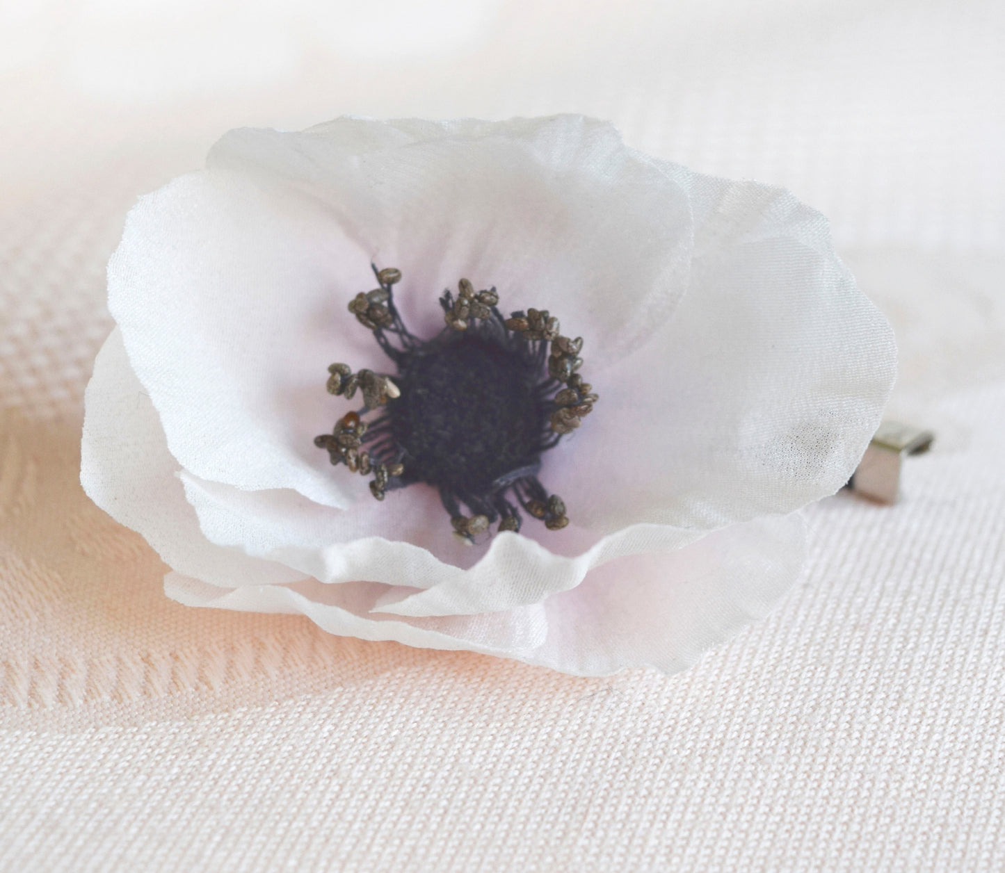 Broche de anémona.