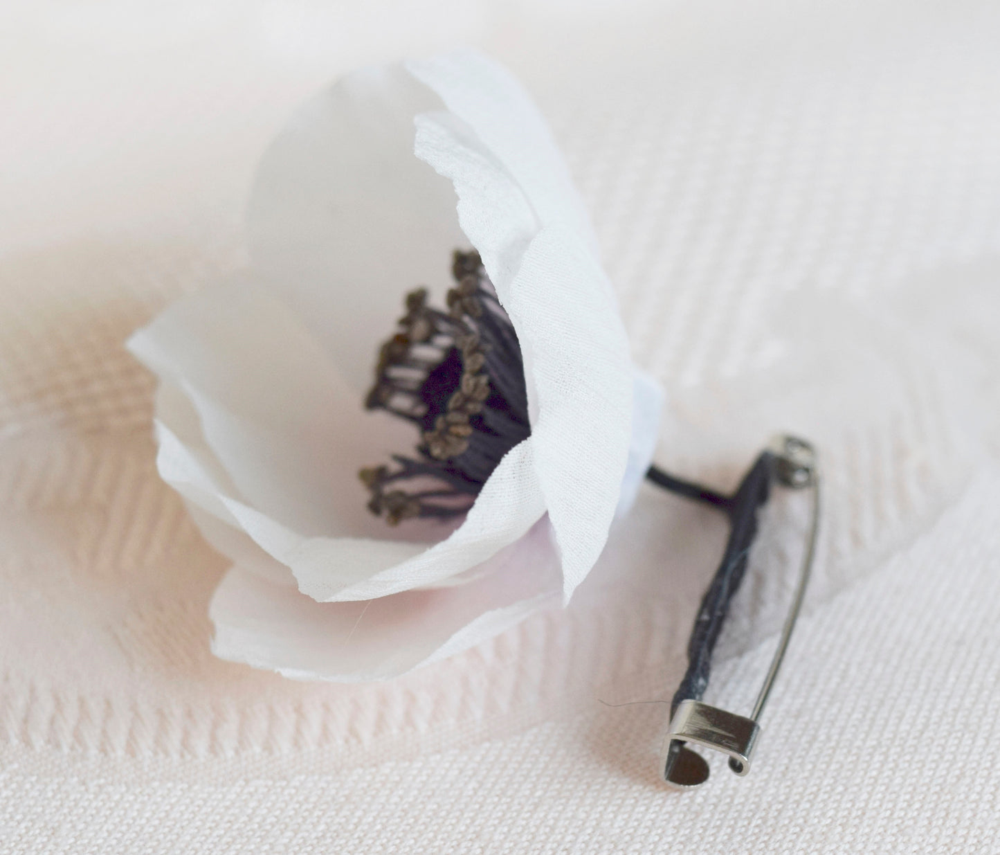 Broche de anémona.