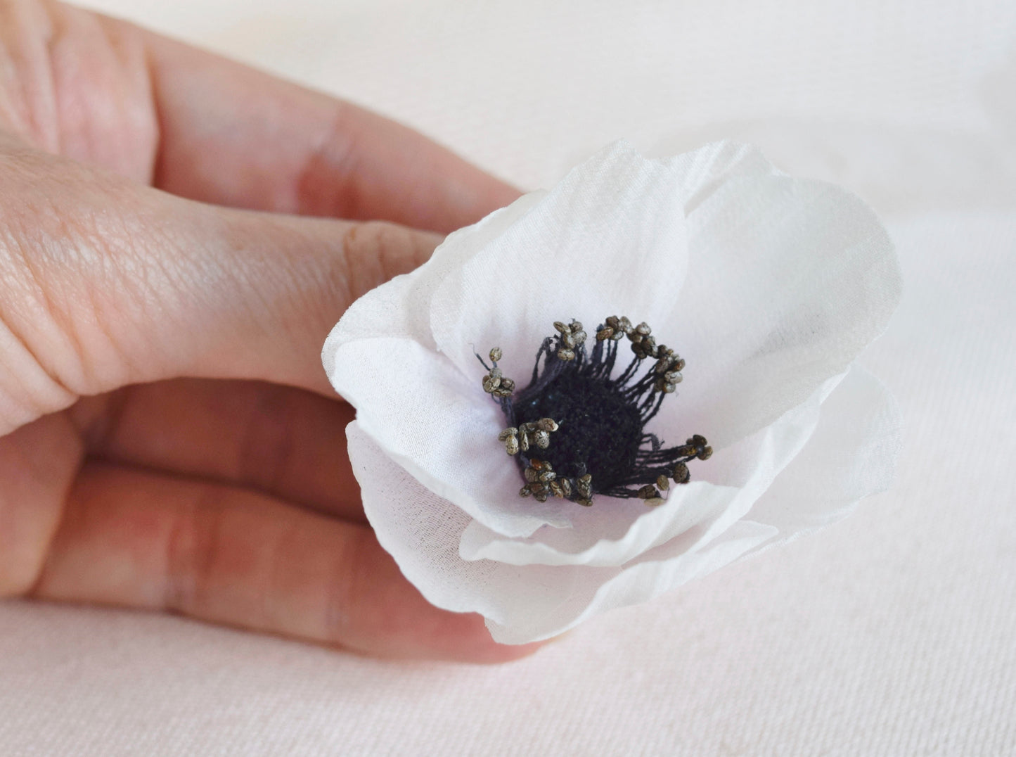 Broche de anémona.