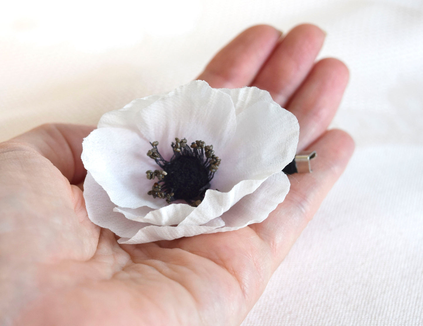 Broche de anémona.