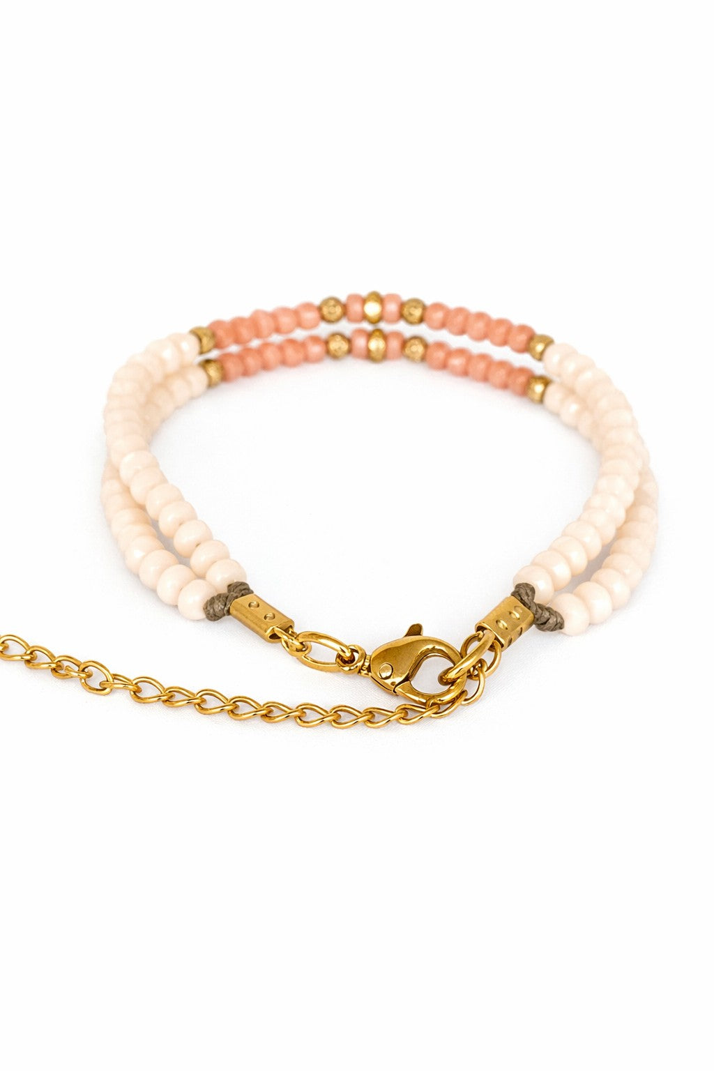 Pulsera de cristal doble blanco y rosa.