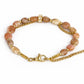 Pulsera de piedra del sol con cadenas doradas.
