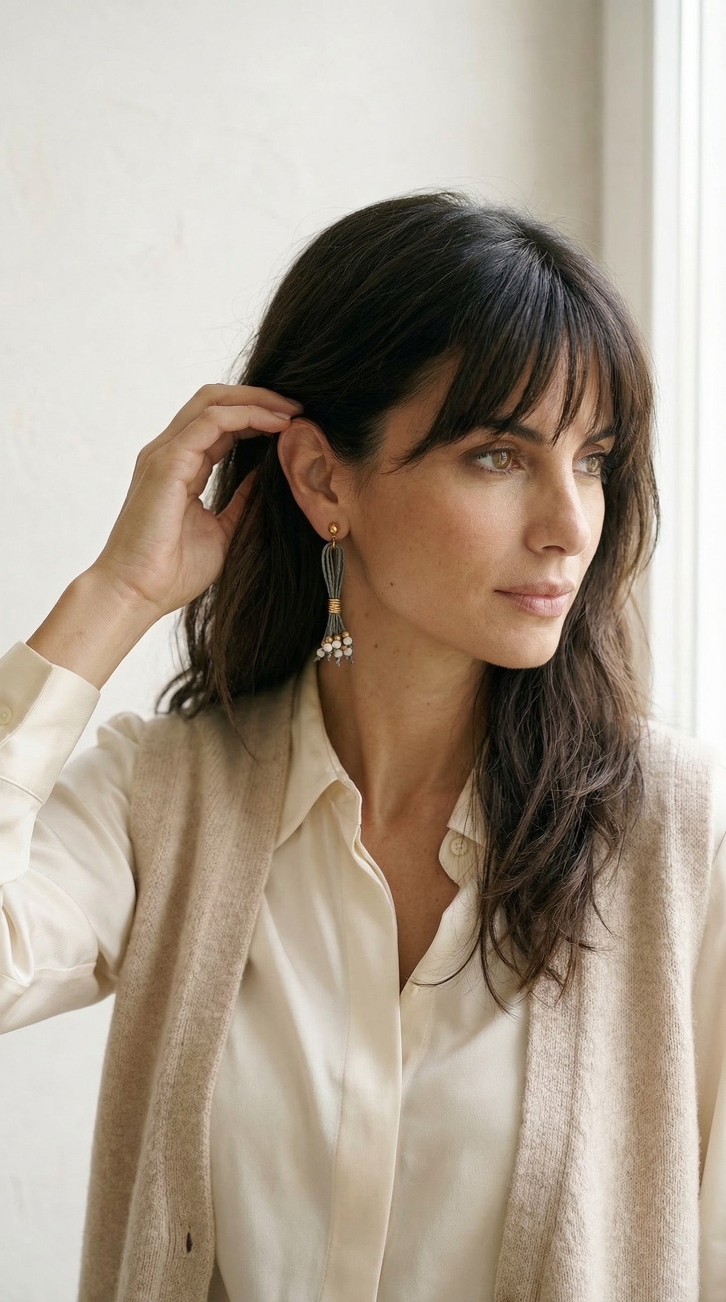 Pendientes de lino y cuentas de cristal y acero.