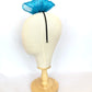 Diadema lazo azul grande elegante para invitada de boda, tocado sofisticado mujer, ideal eventos formales y celebraciones.