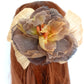 Lazon para recogido con flor en tonos marrones y anaranjados para fiesta.