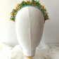 Diadema bohemia de flores preservadas en tonos suaves y alegres.