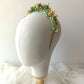Diadema bohemia de flores preservadas en tonos suaves y alegres.