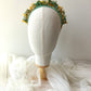 Diadema bohemia de flores preservadas en tonos suaves y alegres.