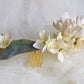 Headdress of azaleas and hydrangeas.
